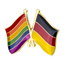 A pin badge featuring a colorful enamel pin with a rainbow flag and a German flag crossed together.