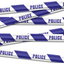 A length of 3M police barrier tape with the words 'POLICE' printed in a contrasting color. © Tigoli® 2026 All Rights Reserved Panda Loco Ltd
