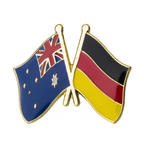 A pin badge featuring the flags of Australia and Germany in enamel with a gold-colored border and a butterfly clutch backing.