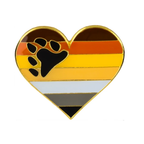 A heart-shaped pin badge with a bear paw print in the center, featuring bands of color resembling a rainbow pattern.