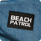 Beach Patrol Black Lifeguard Buoy Iron On Patch (7.8 x 5cm)