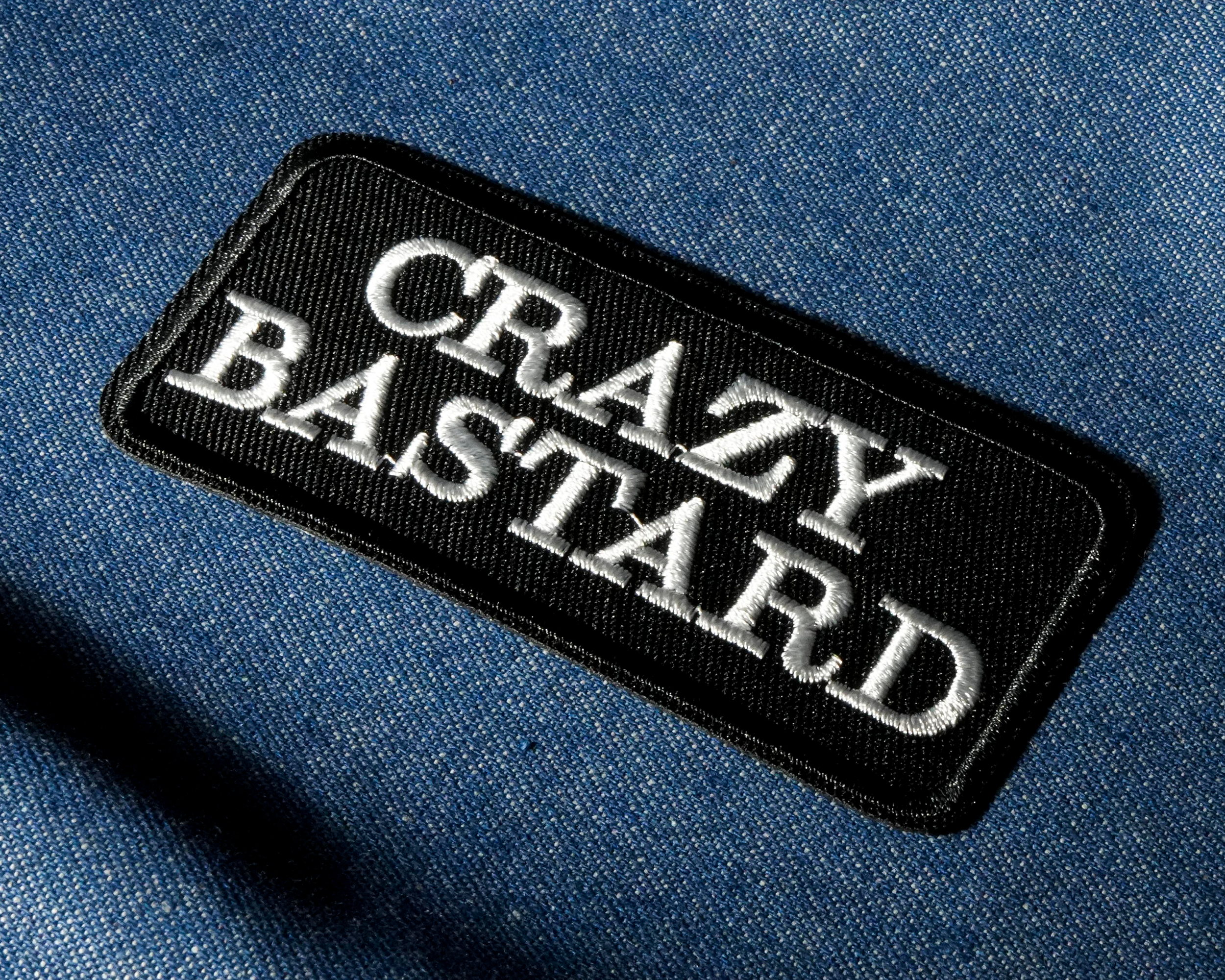 Crazy Bastard Patch Iron On (9 x 4.5cm) Secondary image
