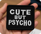 Cute But Psycho Black Iron On Patch (10 x 7cm)