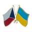 A pin badge featuring the flags of the Czech Republic and Ukraine in enamel colors with a brass plated iron backing.