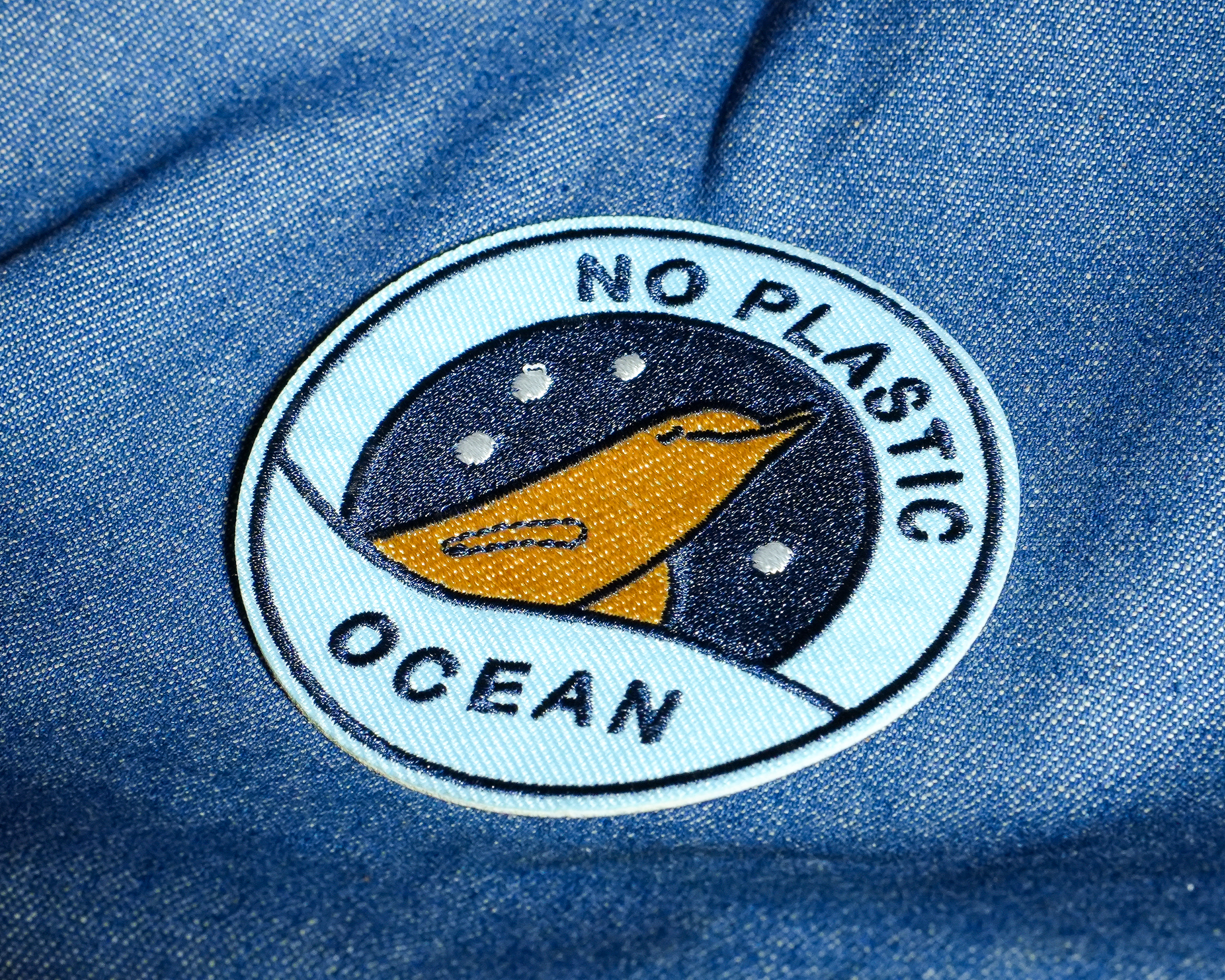 Dolphin Plastic Ocean Embroidery Patch (7.5 x 7.5cm) Secondary image