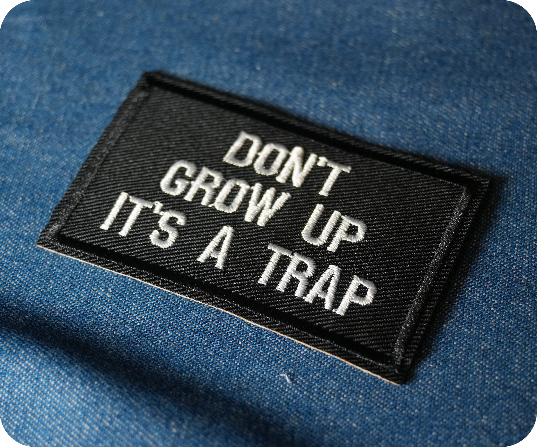 Don't Grow Up It's A Trap Black Iron On Patch (7.8 x 5cm)