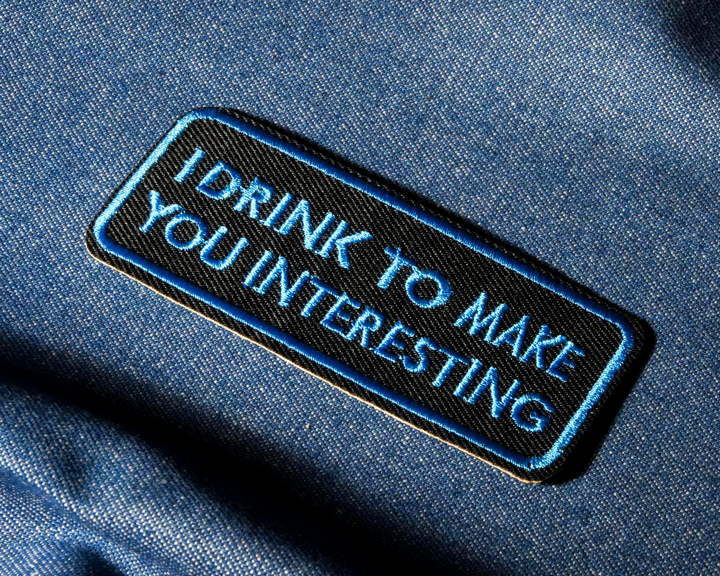 I Drink To Make You Interesting Patch Iron On (9x 4cm) Secondary image