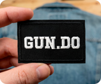 Gun Do. Black Iron On Patch (7.8 x 5cm)