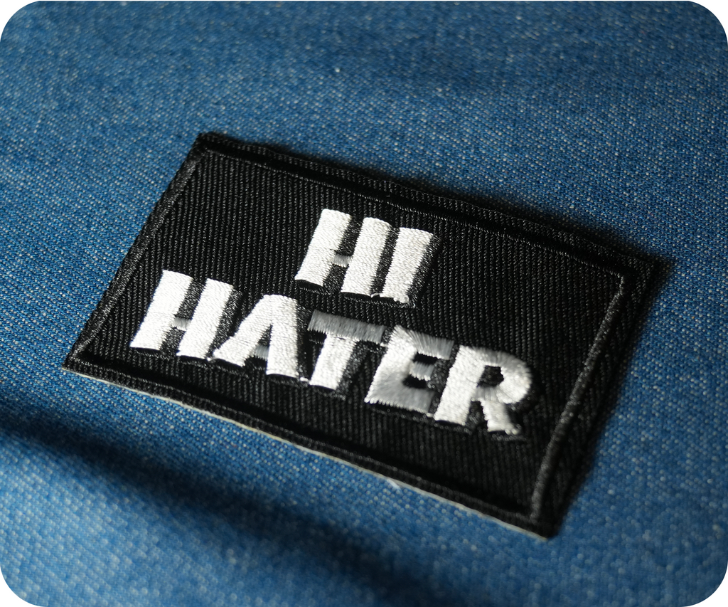 Hi Hater Black Iron On Patch (7.8 x 5cm)