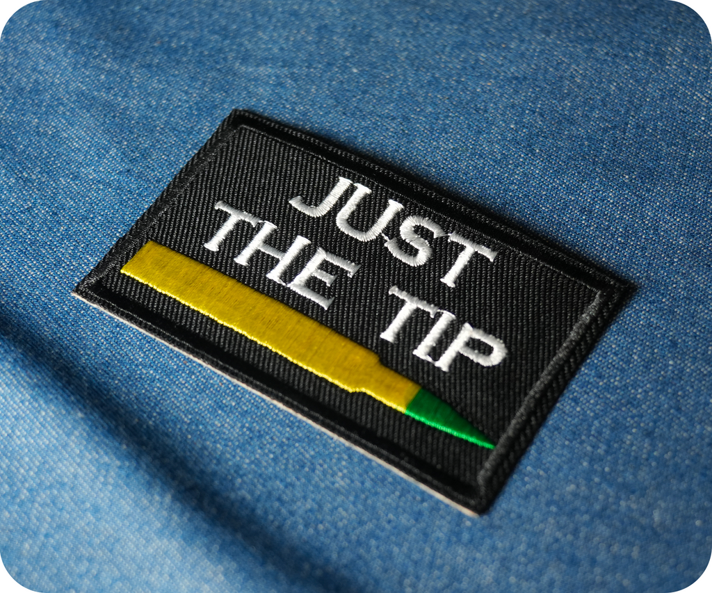 Just The Tip Bullet Funny Black Iron On Patch (7.8 x 5cm)