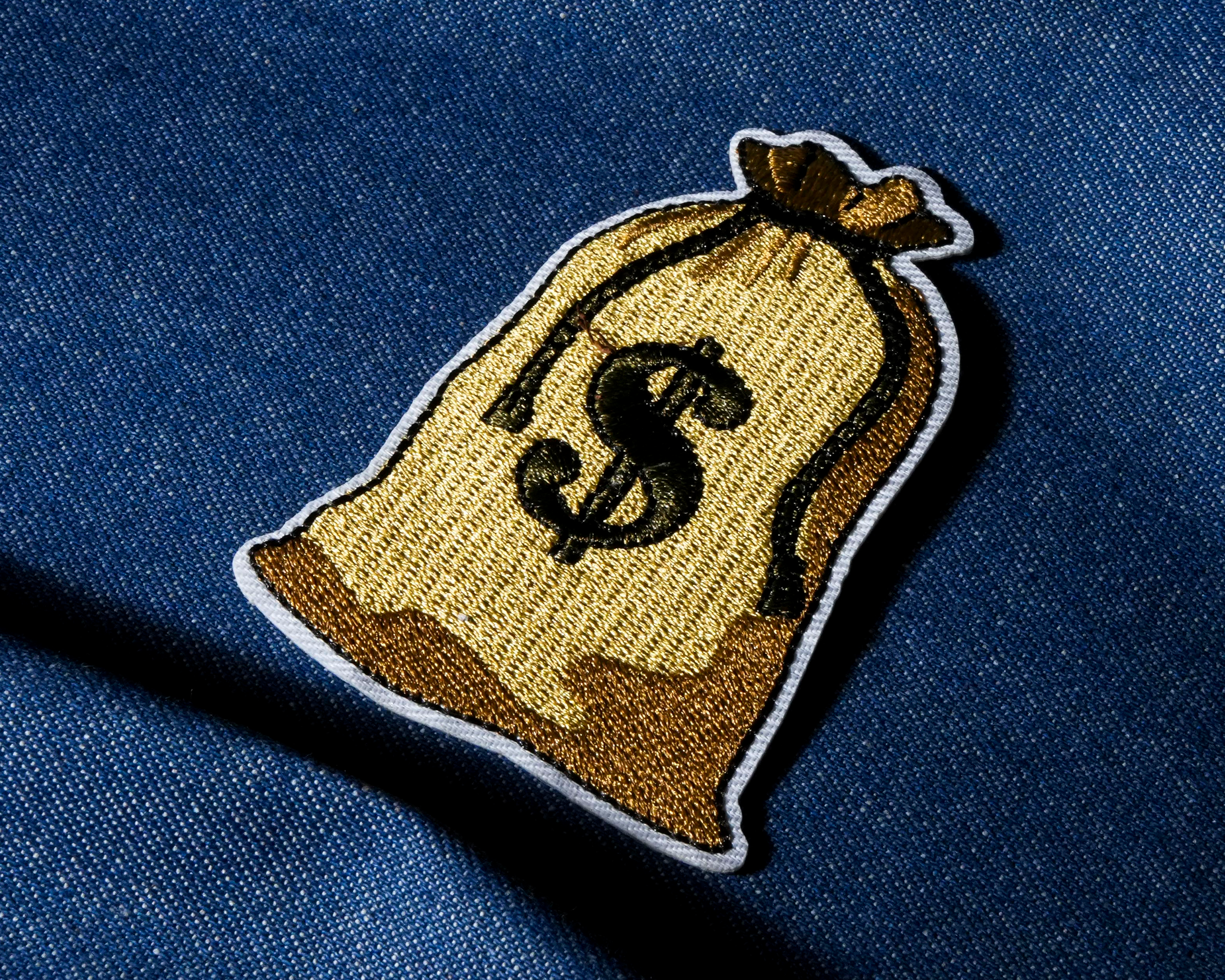 Parche termoadhesivo "Saco de Dinero - Botín de Dólares" (8x 5cm) Imagen secundaria del producto