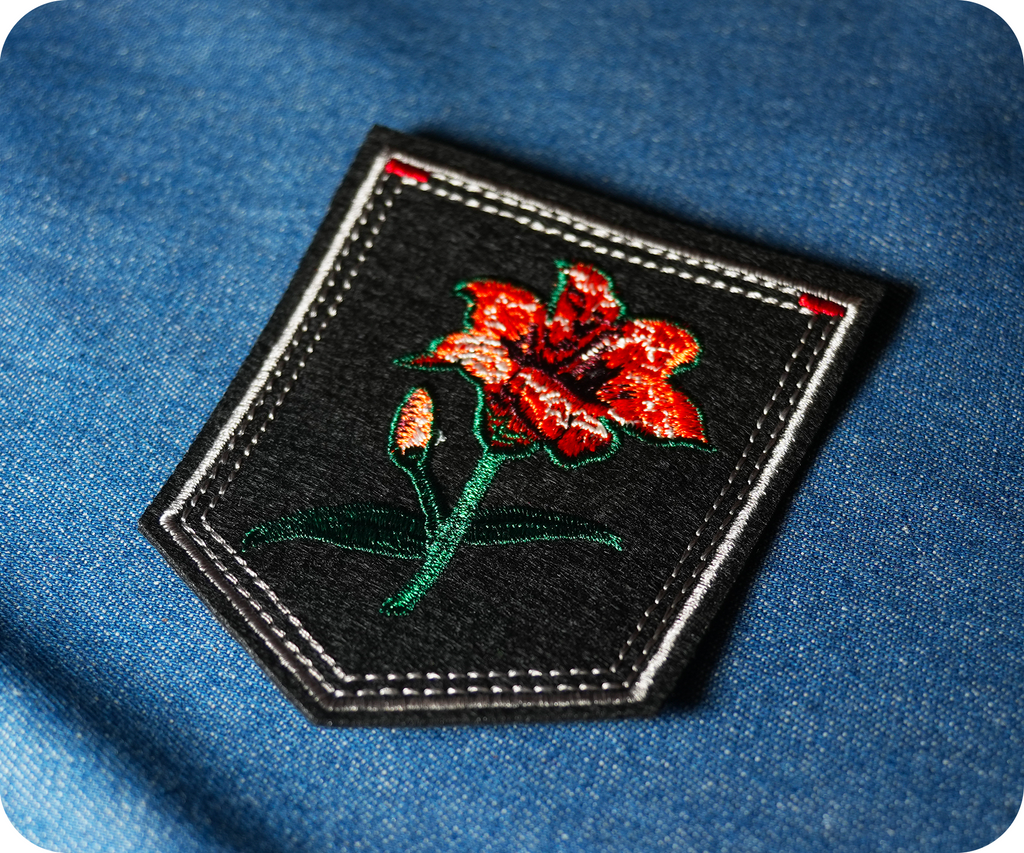 Tiger Lilly Black Shield Iron On Patch (7.6 x 9cm)