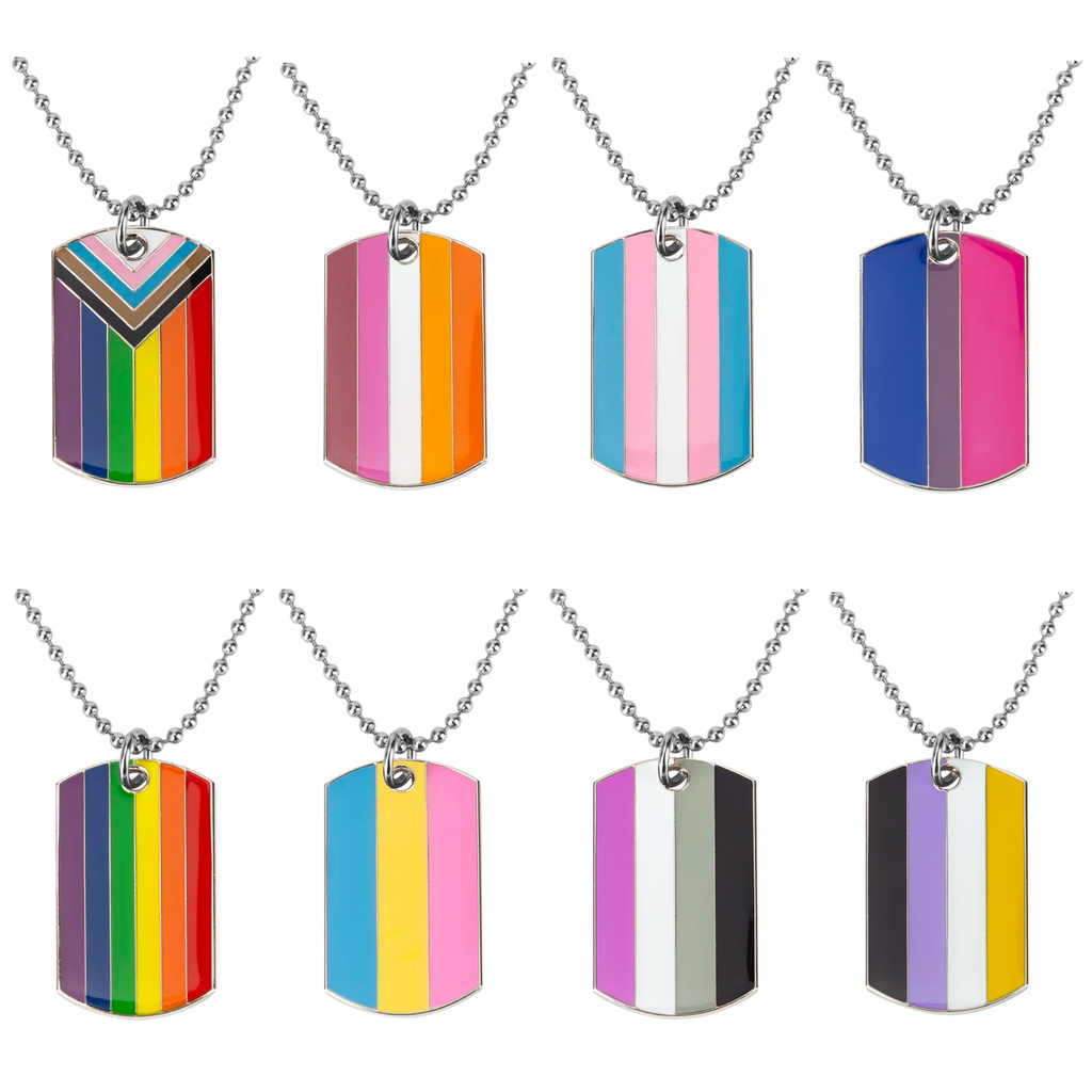 A collection of stainless steel dog tag necklaces with enamel coating, featuring various colors and designs representing the LGBTQI+ flag.