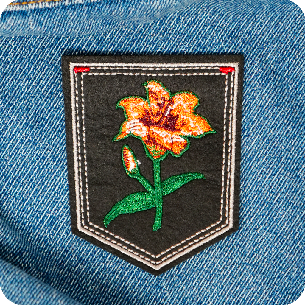 Tiger Lilly Black Shield Iron On Patch (7.6 x 9cm)