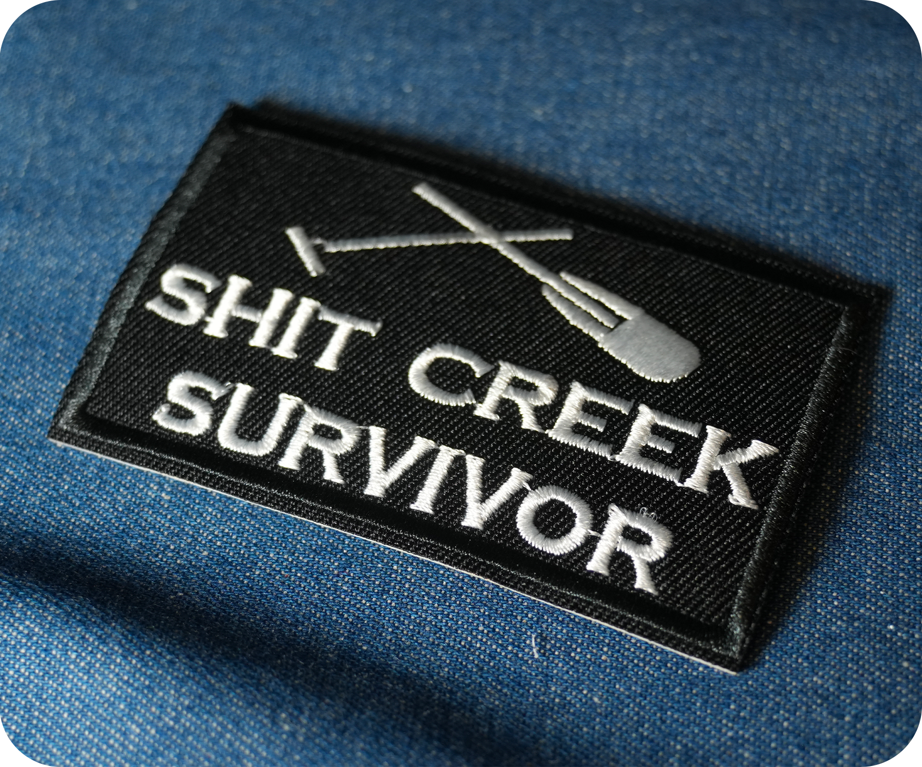 Shit Creeks Survivor Black Iron On Patch (7.8 x 5cm)
