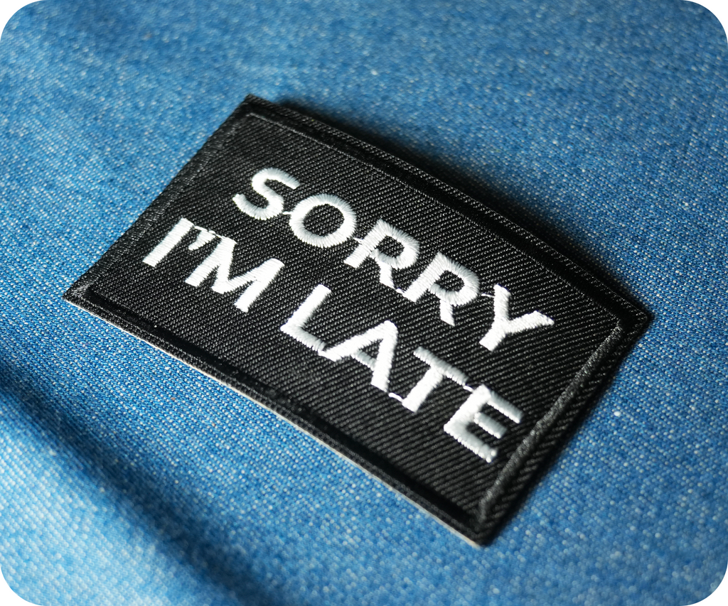 Sorry I'm Late Black Iron On Patch (7.8 x 5cm)