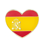 A heart-shaped pin badge with the Spanish flag colors and a crown emblem in the center, designed in yellow and red, with a metallic finish.
