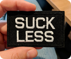 Suck Less Black Iron On Patch (7.8 x 5cm)