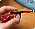 Thompson Submachine Gun Iron On Patch (11 x 2.8cm)