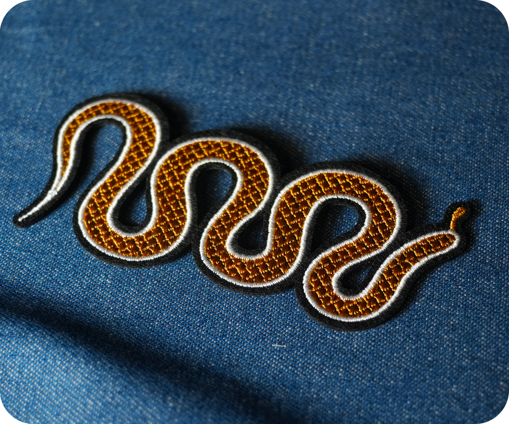 Yellow & Orange Slithering Snake Iron On Patch (10 x 4cm)