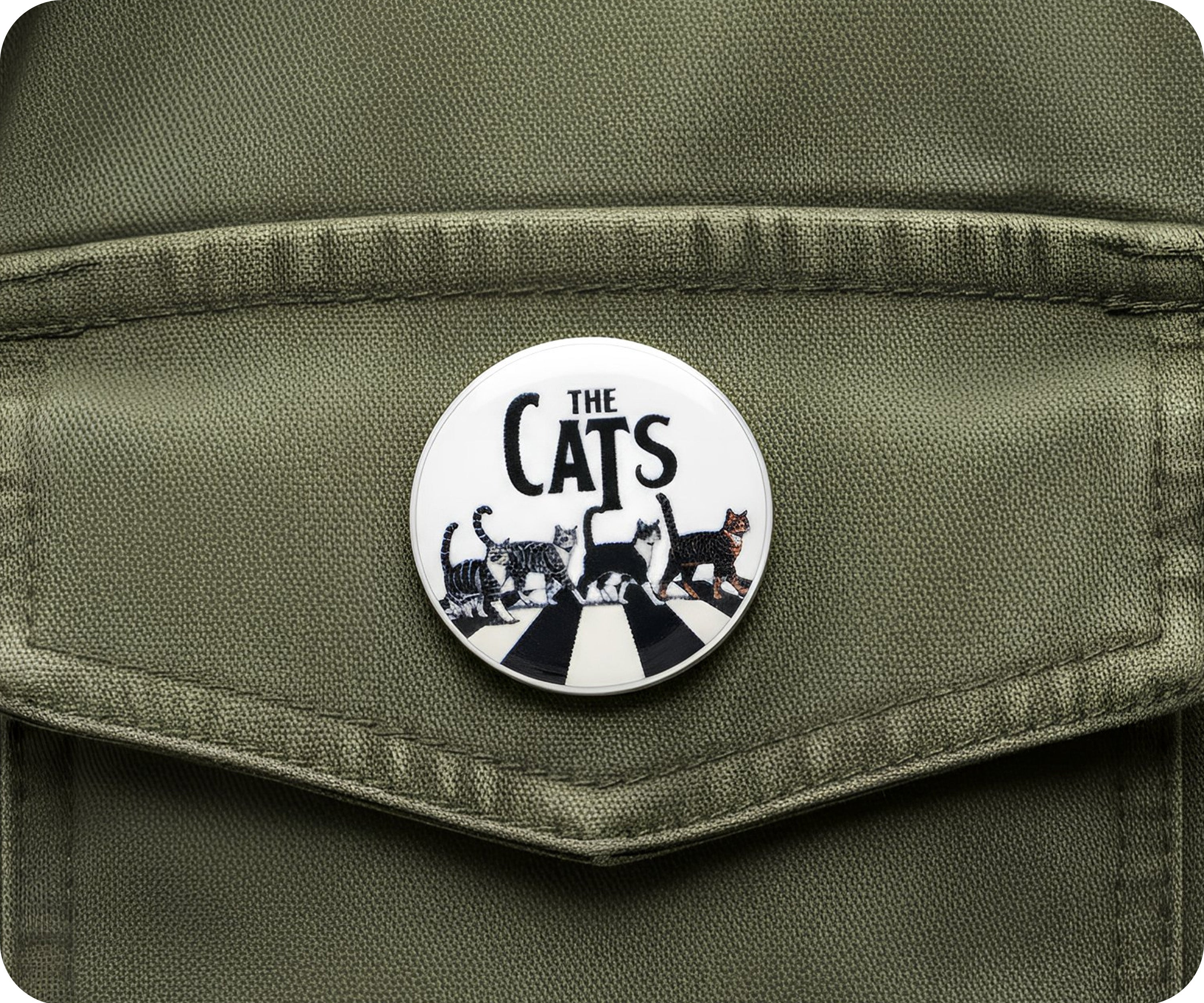 Insignia del cruce de los gatos de la música de Londres