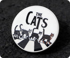 Insignia del cruce de los gatos de la música de Londres