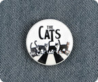 Insignia del cruce de los gatos de la música de Londres