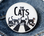 Insignia del cruce de los gatos de la música de Londres
