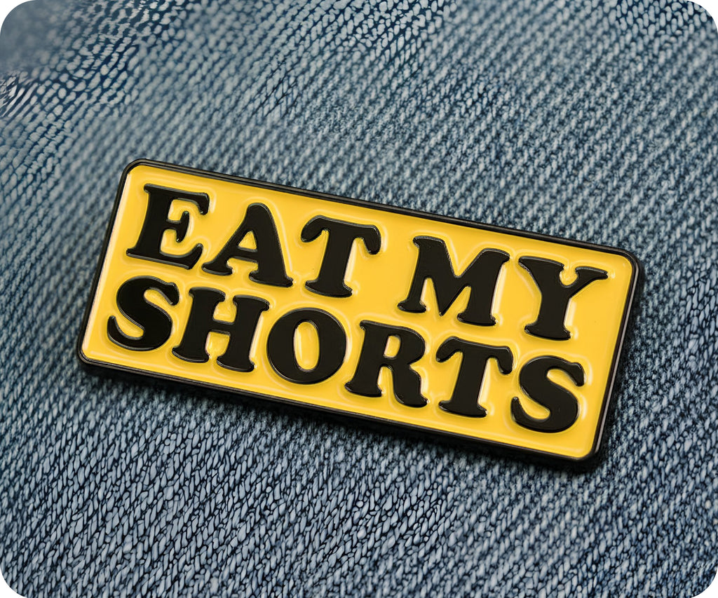 Eat My Shorts Pin Badge
