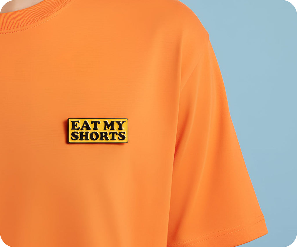 Eat My Shorts Pin Badge