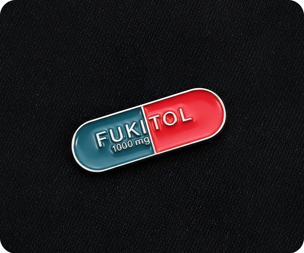 Fukitol Pin Badge