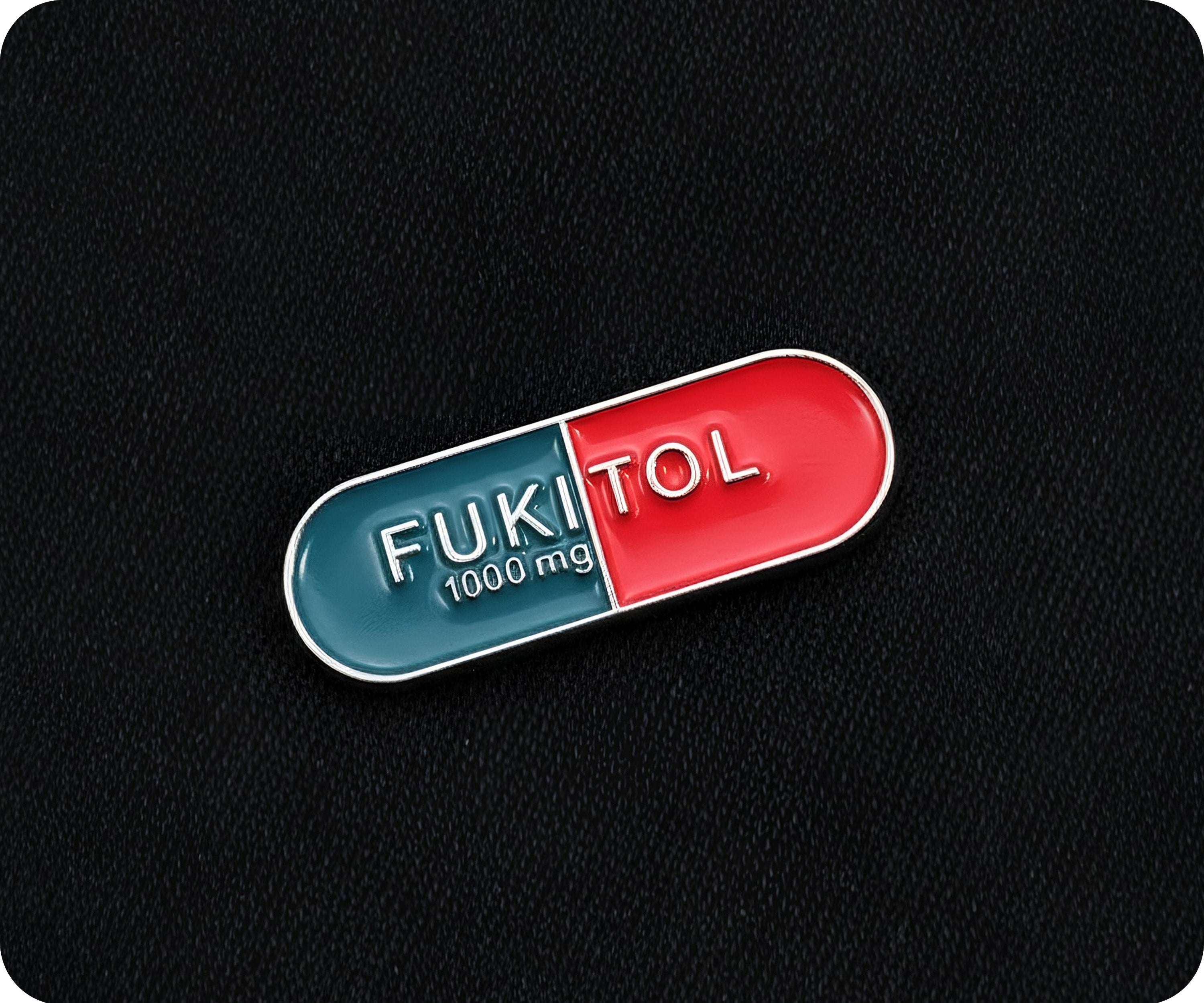 Fukitol Pin Badge