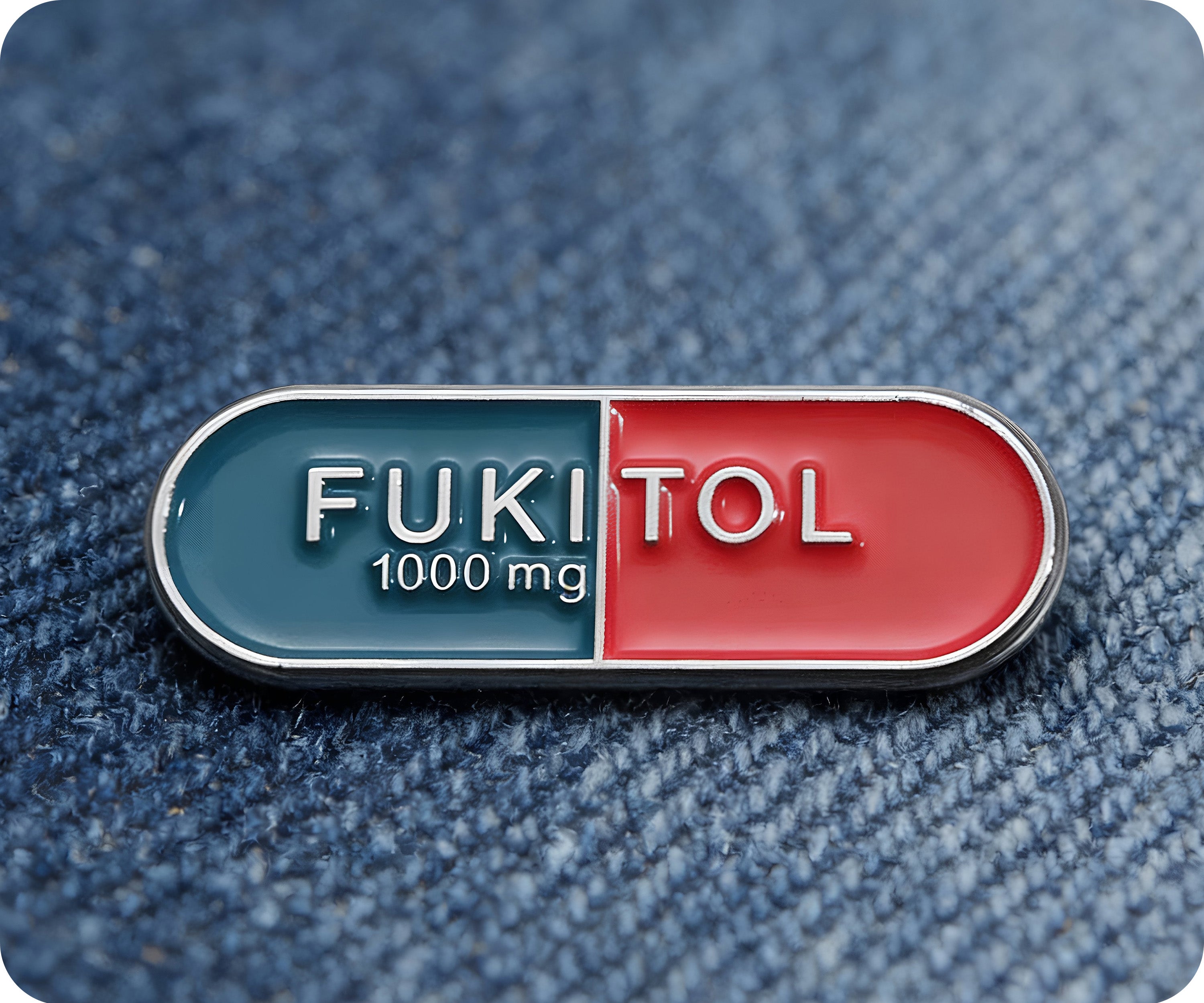 Fukitol Pin Badge