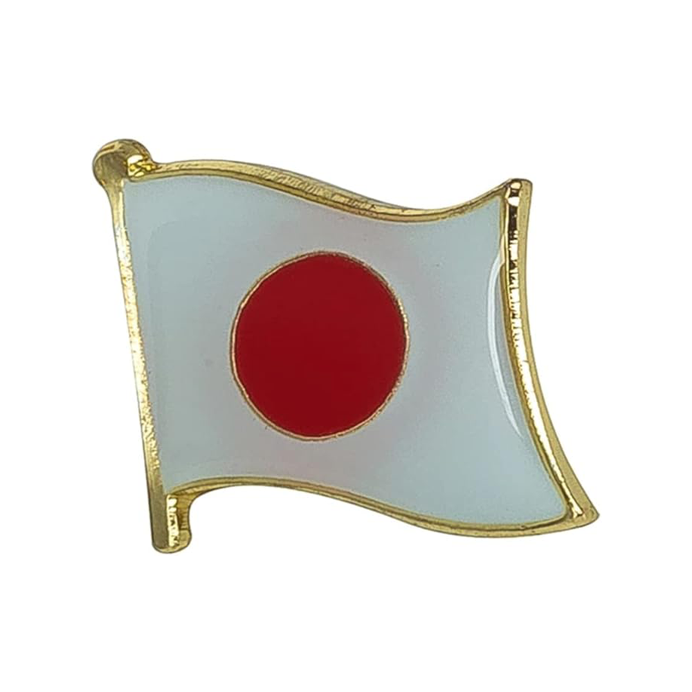 A pin badge featuring the Japan flag with a red circle on it, possibly made of brass and enamel, with a butterfly clutch backing.