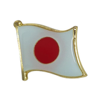 A pin badge featuring the Japan flag with a red circle on it, possibly made of brass and enamel, with a butterfly clutch backing.