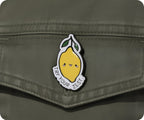 Prueba tu insignia de limón con el lema "Try Your Zest"