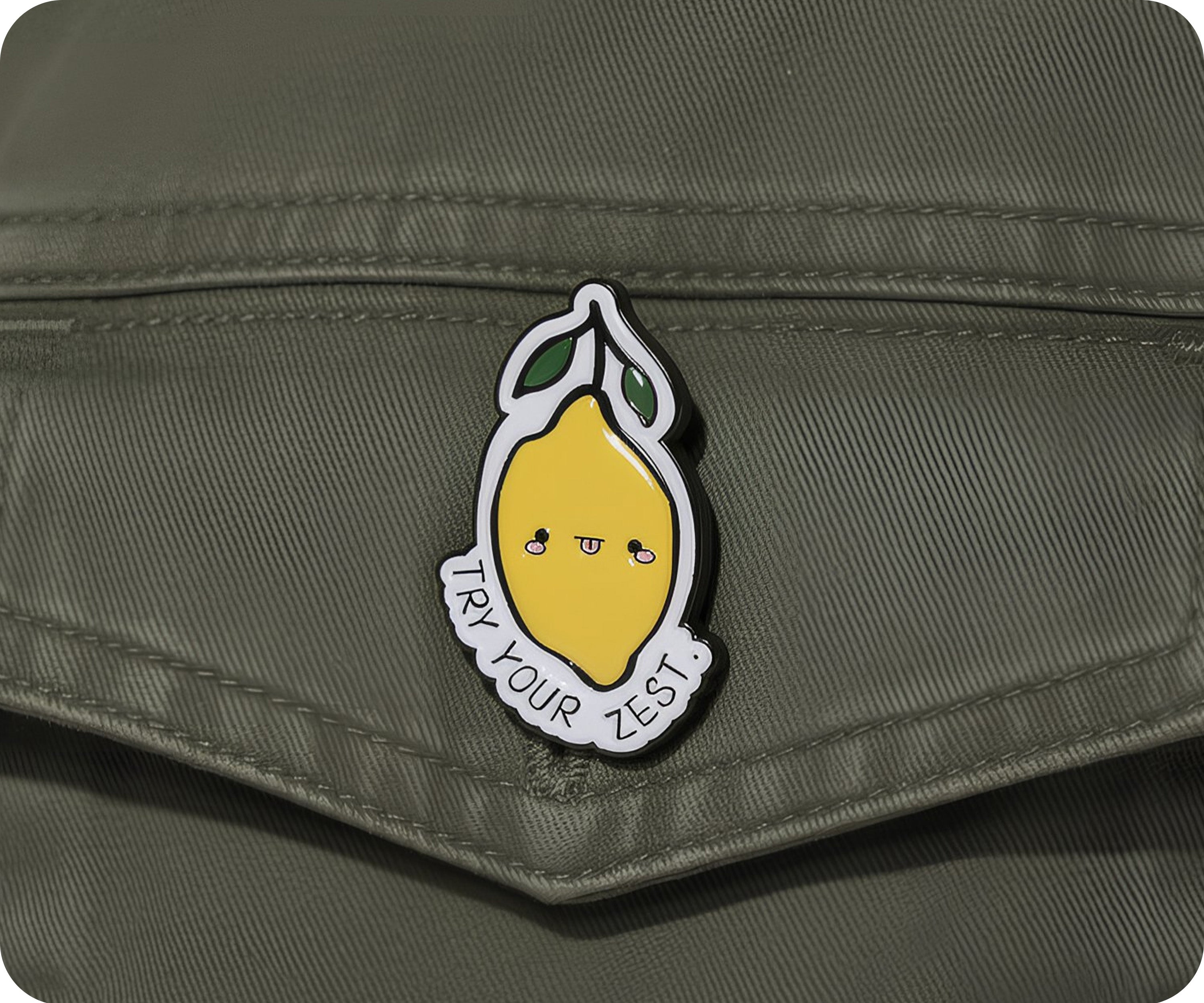 Prueba tu insignia de limón con el lema "Try Your Zest"