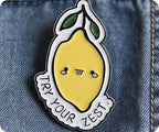 Prueba tu insignia de limón con el lema "Try Your Zest"