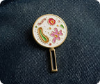 Magnifying Glass Microbes Pin Badge