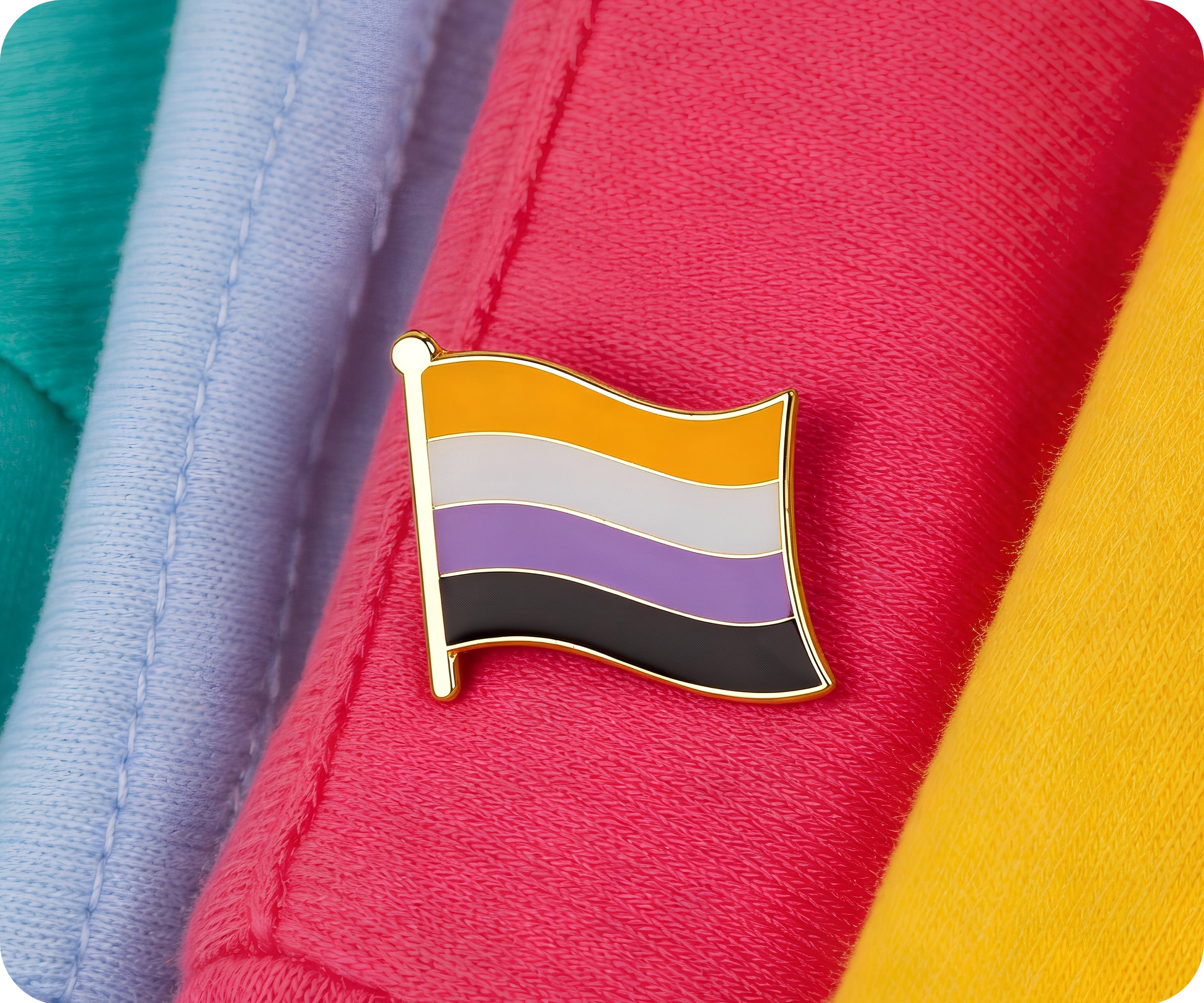 Pin con la bandera no binaria 