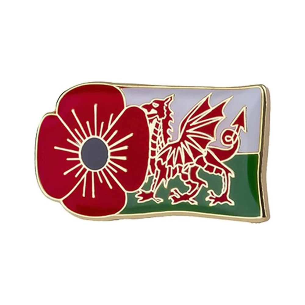 A pin badge featuring a red poppy and the Welsh flag with a dragon, on a green and white background with a brass plated iron edge. Imagen principal del producto