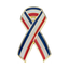 A red, white, and blue ribbon-shaped pin badge with a brass plated iron and hard enamel finish.