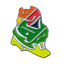 A multicolored pin badge shaped like Saudi Arabia with text and decorative elements.
