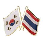 A badge featuring the flags of South Korea and Thailand with a butterfly clutch. © Tigoli® 2026 All Rights Reserved Panda Loco Ltd 