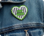 Stay Weird Black & Green Horror Pin Badge