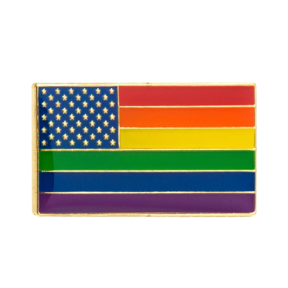 A rectangular pin badge featuring the colors of the United States flag in a rainbow pattern, with a butterfly clutch at the back.