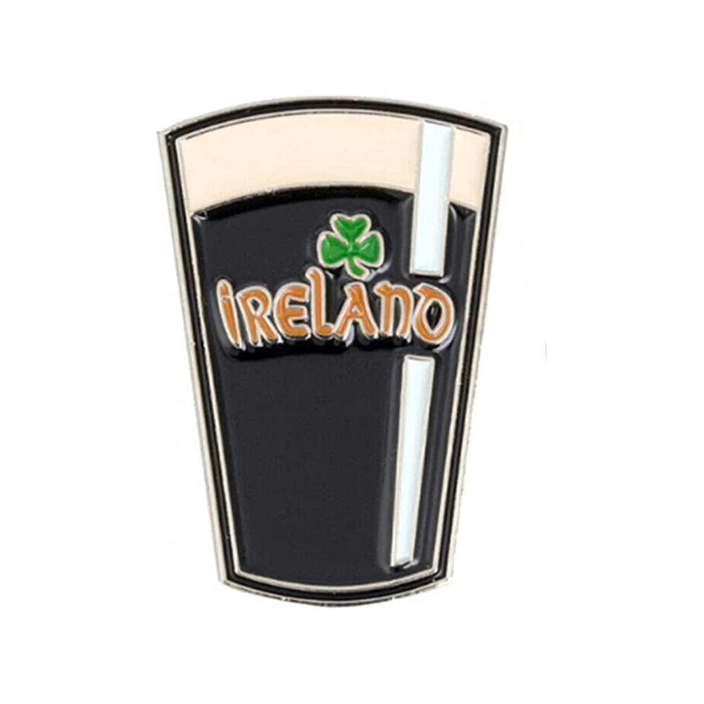 A pin badge featuring a brass plated iron frame with hard enamel, shaped like a beer glass with 'IRELAND' written inside and a clover leaf symbol on the top. © Tigoli® 2026 All Rights Reserved Panda Loco Ltd  Imagen principal del producto