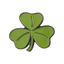 A green four-leaf clover pin badge with a black outline. © Tigoli® 2026 All Rights Reserved Panda Loco Ltd 