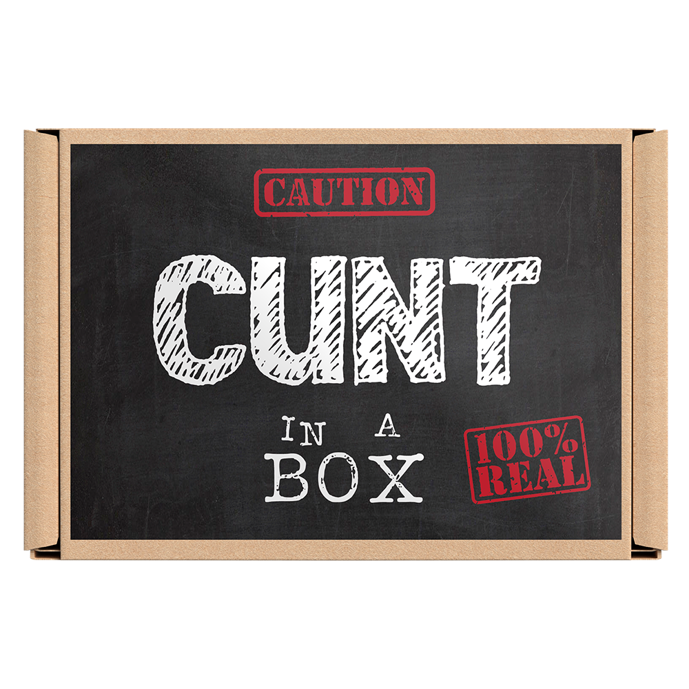 The image displays the packaging of the "Cunt In a Box" product, which is humorously designed to look like a box with a warning label that says "CAUTION: CUNT IN A 100% REAL BOX." The box is brown with a chalkboard-like texture, and the label adds a playful, risquu00e9 touch to the presentation. © Tigoli® 2026 All Rights Reserved Panda Loco Ltd  Imagen principal del producto